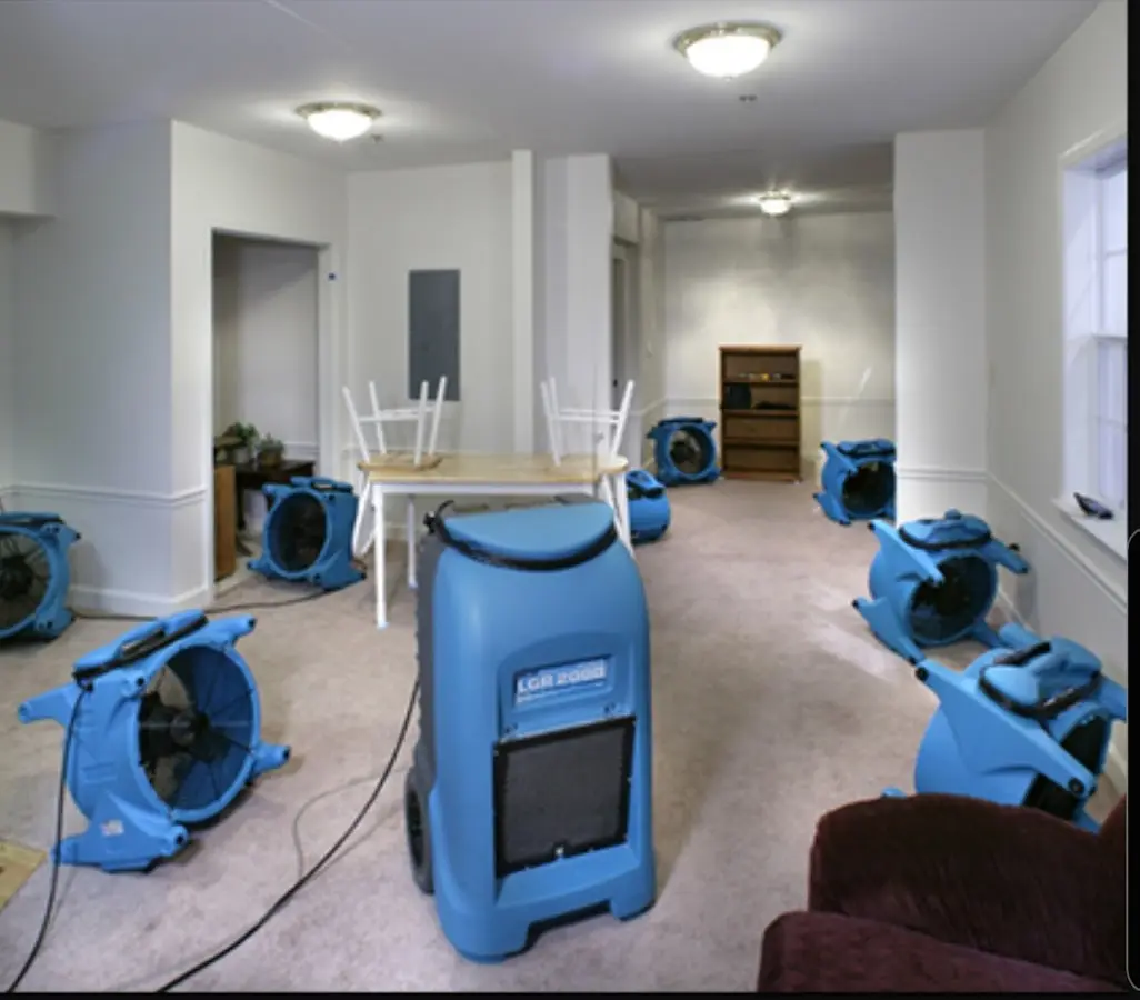 Air movers and dehumidifier setup for Water Damage Restoration in Bennington